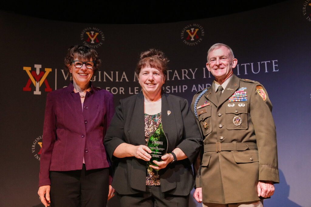 Gwynn holds an award, flanked by Gwynn and Gray.